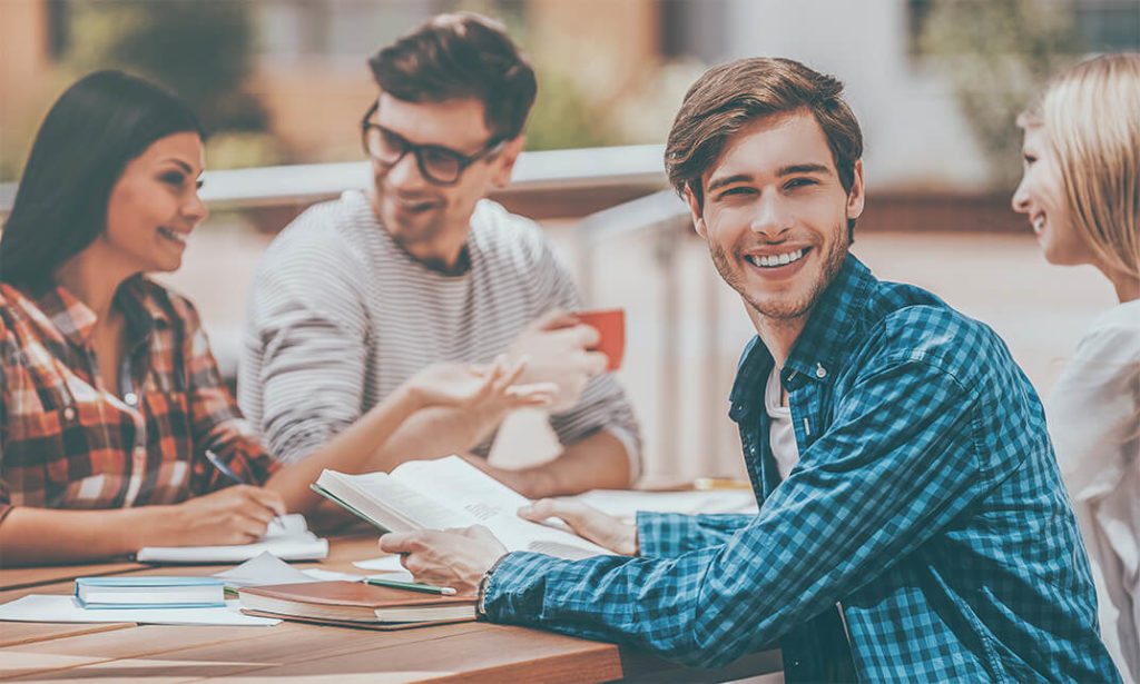 A group of people are discussing the Personal Development Quantum Leap Strategy.