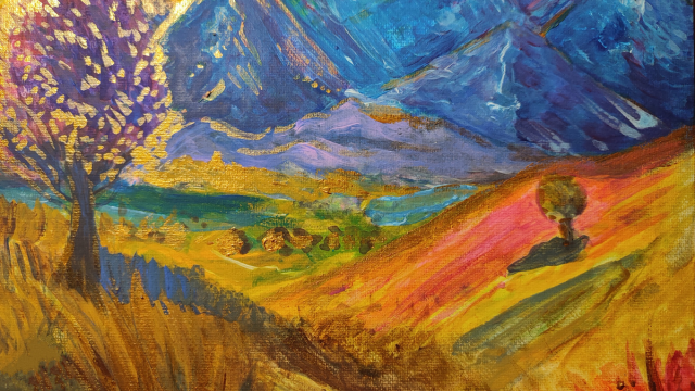 Artist painting a modern acrylic artwork on canvas using vibrant colours and textured brushstrokes in a creative studio.