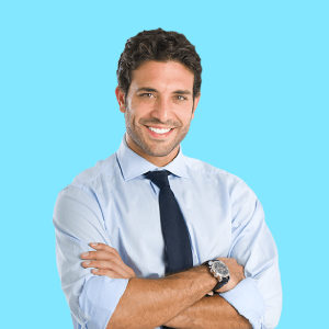 Image of a person standing confidently with arms crossed, symbolizing personal leadership skills. They are framed against a blurred background of a cityscape, suggesting the urban environment where leadership often thrives.