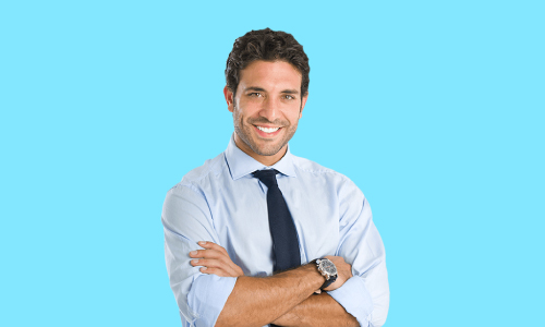 Image of a person standing confidently with arms crossed, symbolizing personal leadership skills. They are framed against a blurred background of a cityscape, suggesting the urban environment where leadership often thrives.