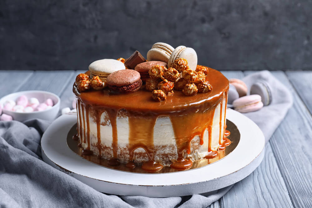 Caramel Cake with biscuits and fried nuts frosting