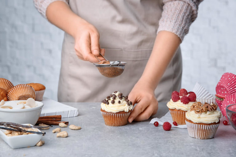 man learning decoration to become a baker