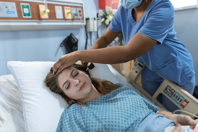 Nurse treating a patient