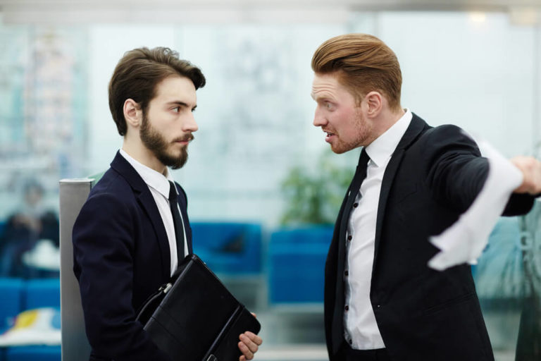 Angry boss shouting at one of employees, not assertive communication skills activities