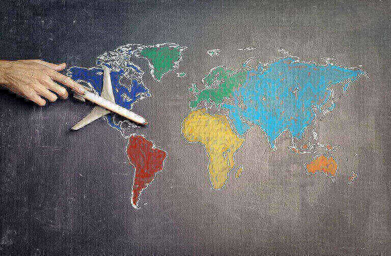 Toy plane over a world map