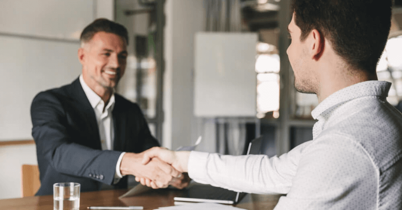 business-leaders-shaking-hands-with-confidence