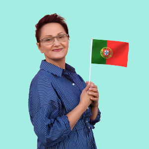 A woman with short hair, wearing a blue shirt, holds a Portugal flag.