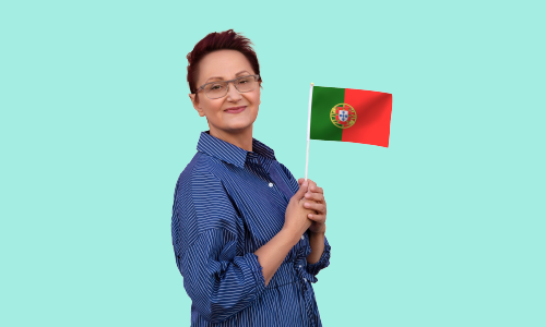 A woman with short hair, wearing a blue shirt, holds a Portugal flag.