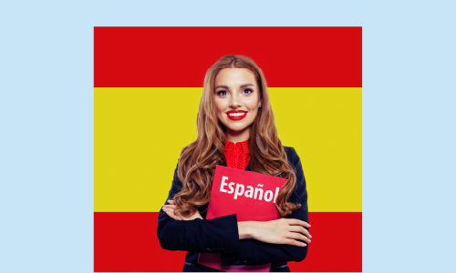 A Spanish girl smiling with the Spanish flag in the background.
