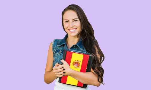 A Spanish girl holding a Spanish flag in her hand.