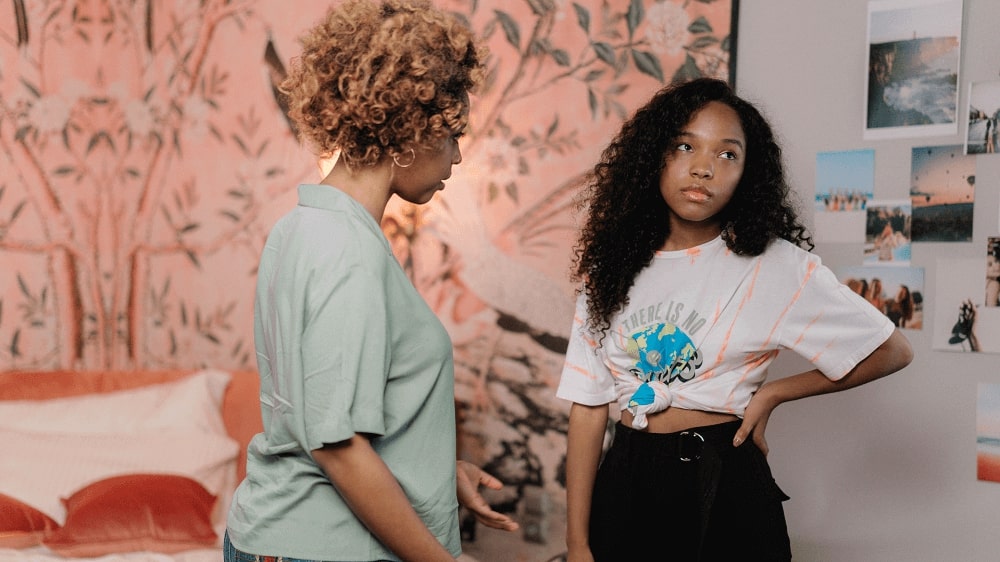 A mother talks to her annoyed daughter, with a focus on time of day, energy level, and medication.