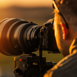 A person holding camera for Advanced Photography Course