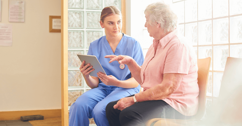 Certified Nursing Assistant is talking with the Patients about the health care issues