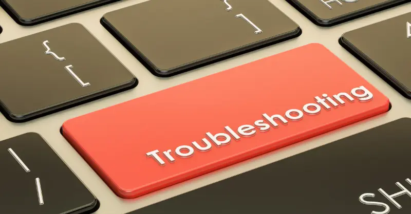 Troubleshooting concept shown through a red keyboard key among black keys with code symbols, highlighting technical issue resolution