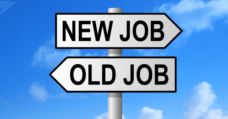 Directional signpost with 'New Job' and 'Old Job' under a blue sky, symbolizing career change and alternative jobs for teachers exploring new opportunities.